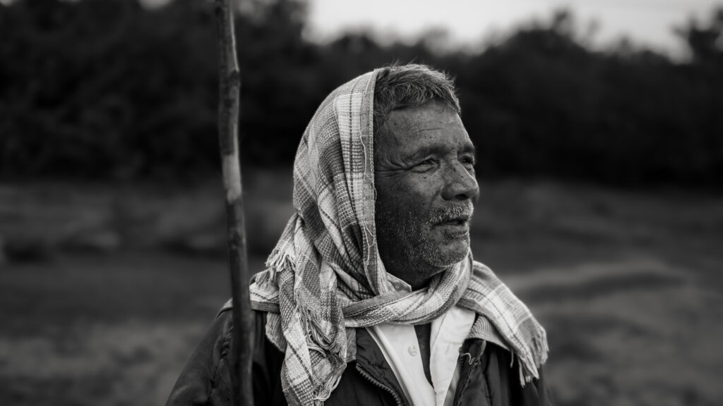Old man looking towards the sky